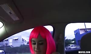 babe in pink wig having intensive sex in the car