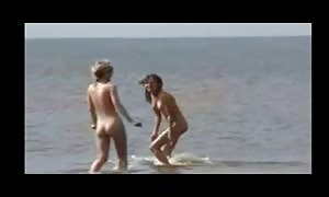 bare naked Beach - Two turned on teenagers
 Frolicking