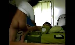 teens poking on a bed