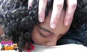 Curly-hair black swallowing his delectable prick with closed eyes