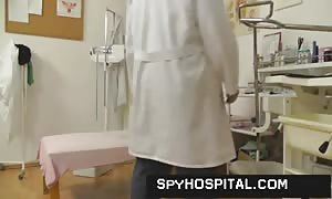 Sporty blond caught on hidden web web-cam in a physicians office