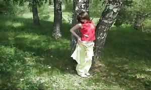 Crazy-minded Russian female is throating
 my boner right in the woods